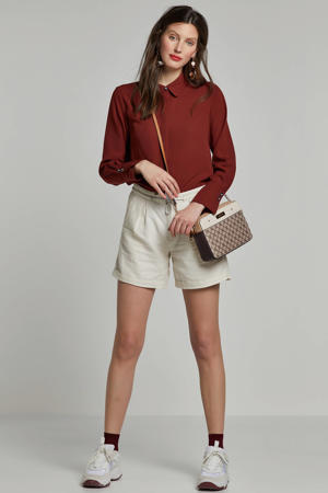 blouse met sierknoopjes