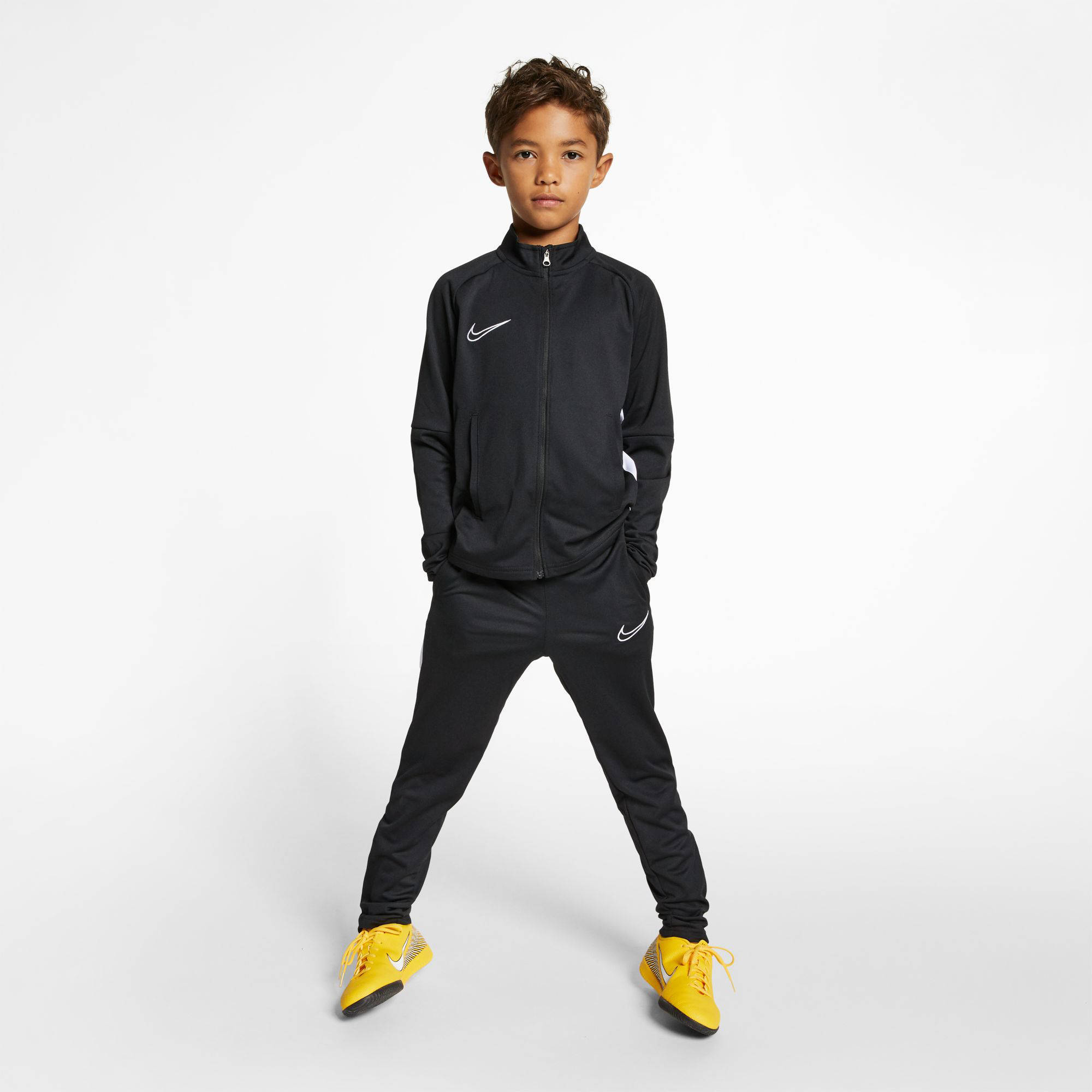 Nike Junior trainingspak zwart/wit | wehkamp