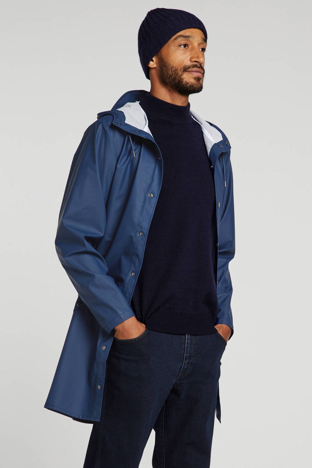 Blauwe unisex Rains regenjas 1202 long jacket van polyester met lange mouwen, capuchon en drukknoopsluiting