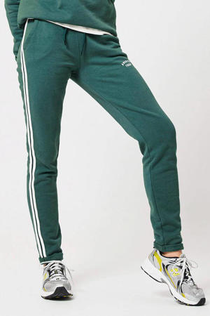 slim fit sweatpants met zijstreep groen