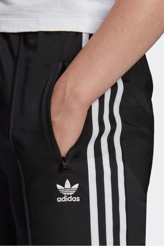 jogger gek werkgelegenheid adidas Originals Adicolor trainingsbroek zwart | wehkamp
