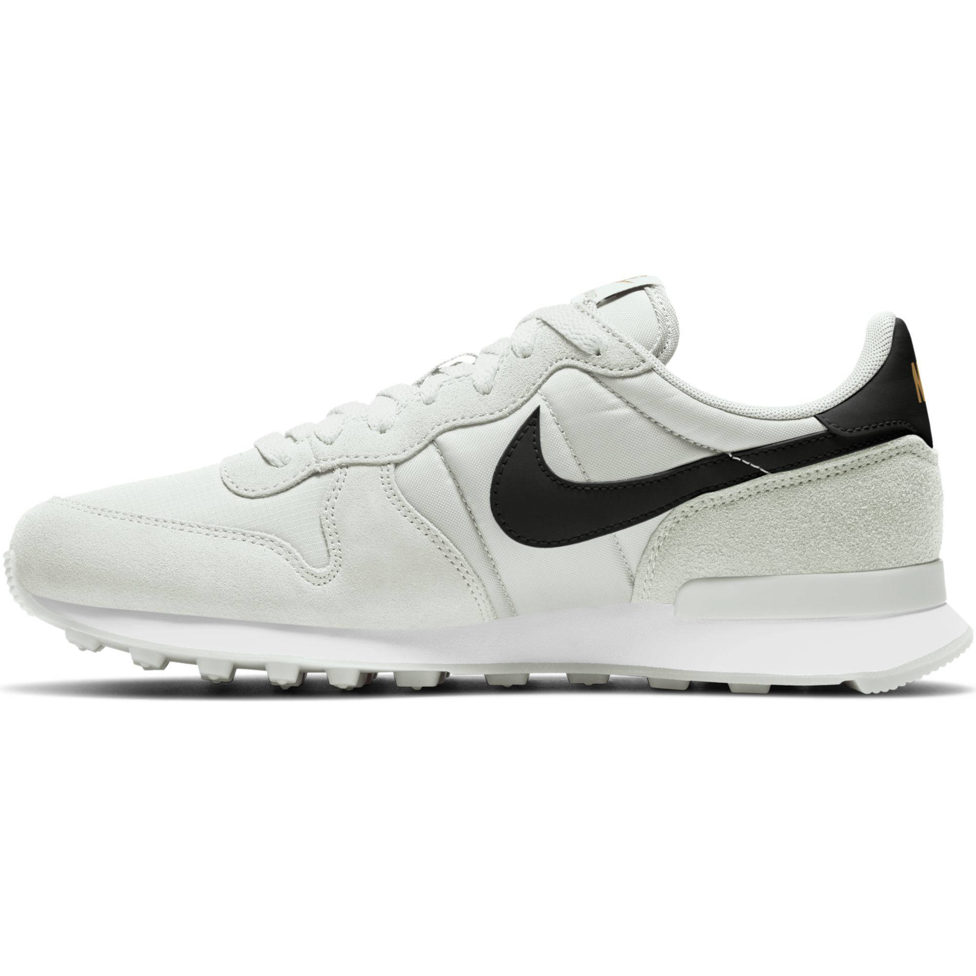 Nike Internationalist sneakers wit/zwart/goud | wehkamp
