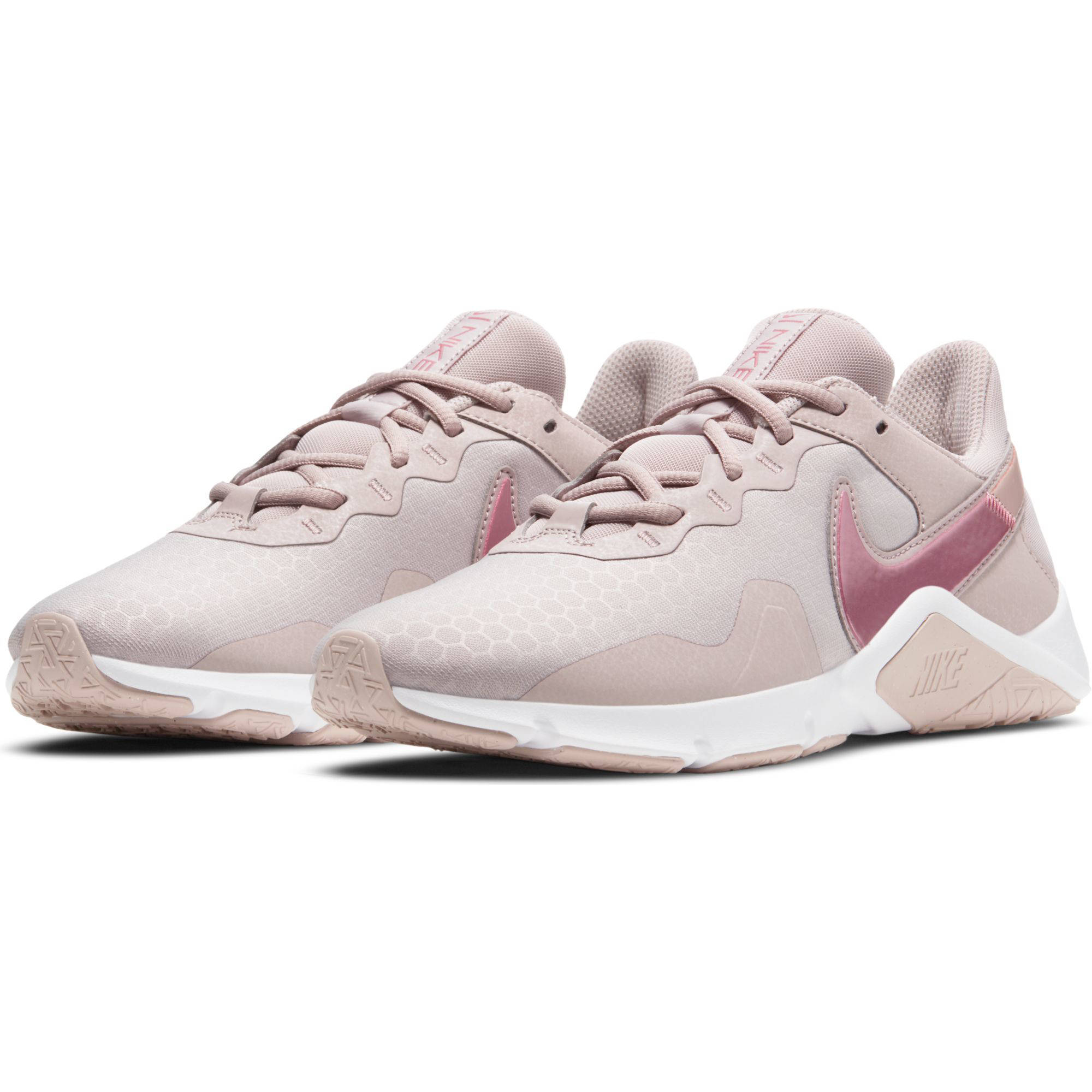 Nike Legend Essential 2 fitness schoenen oudroze/metallic roze | wehkamp
