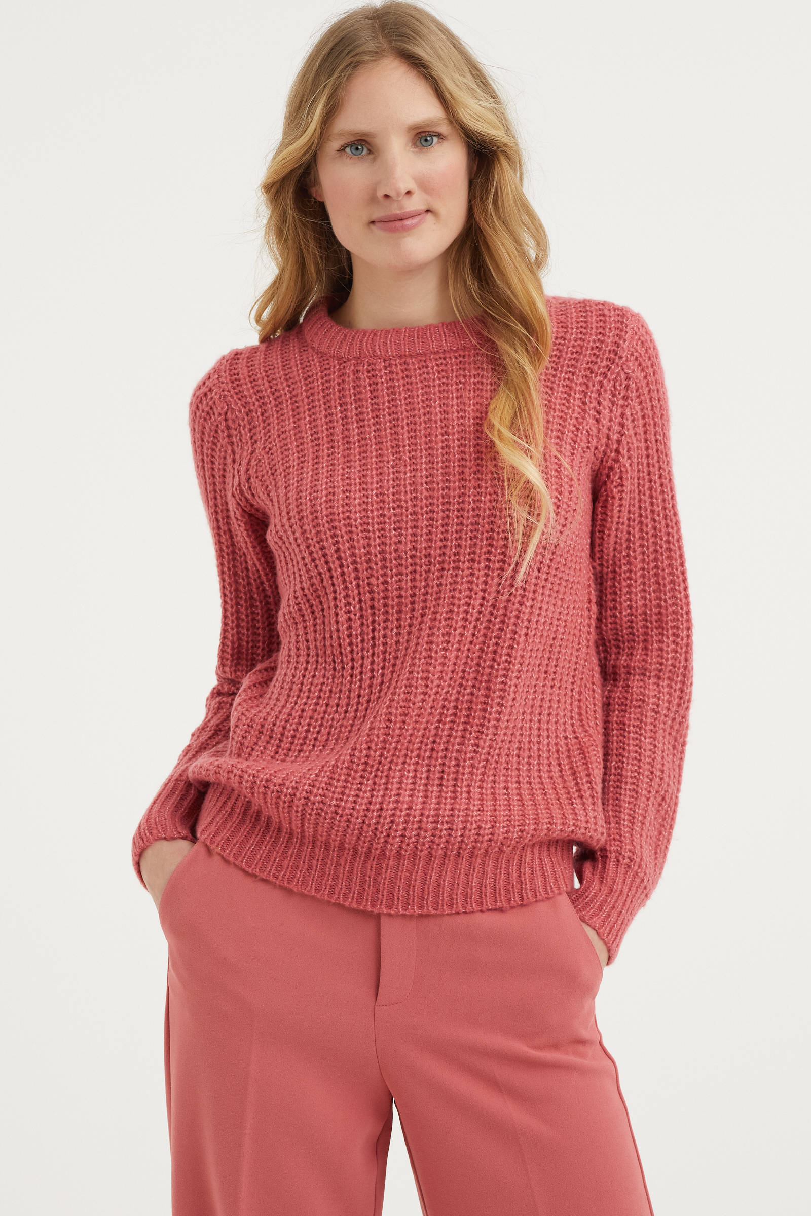 grof gebreide roze trui