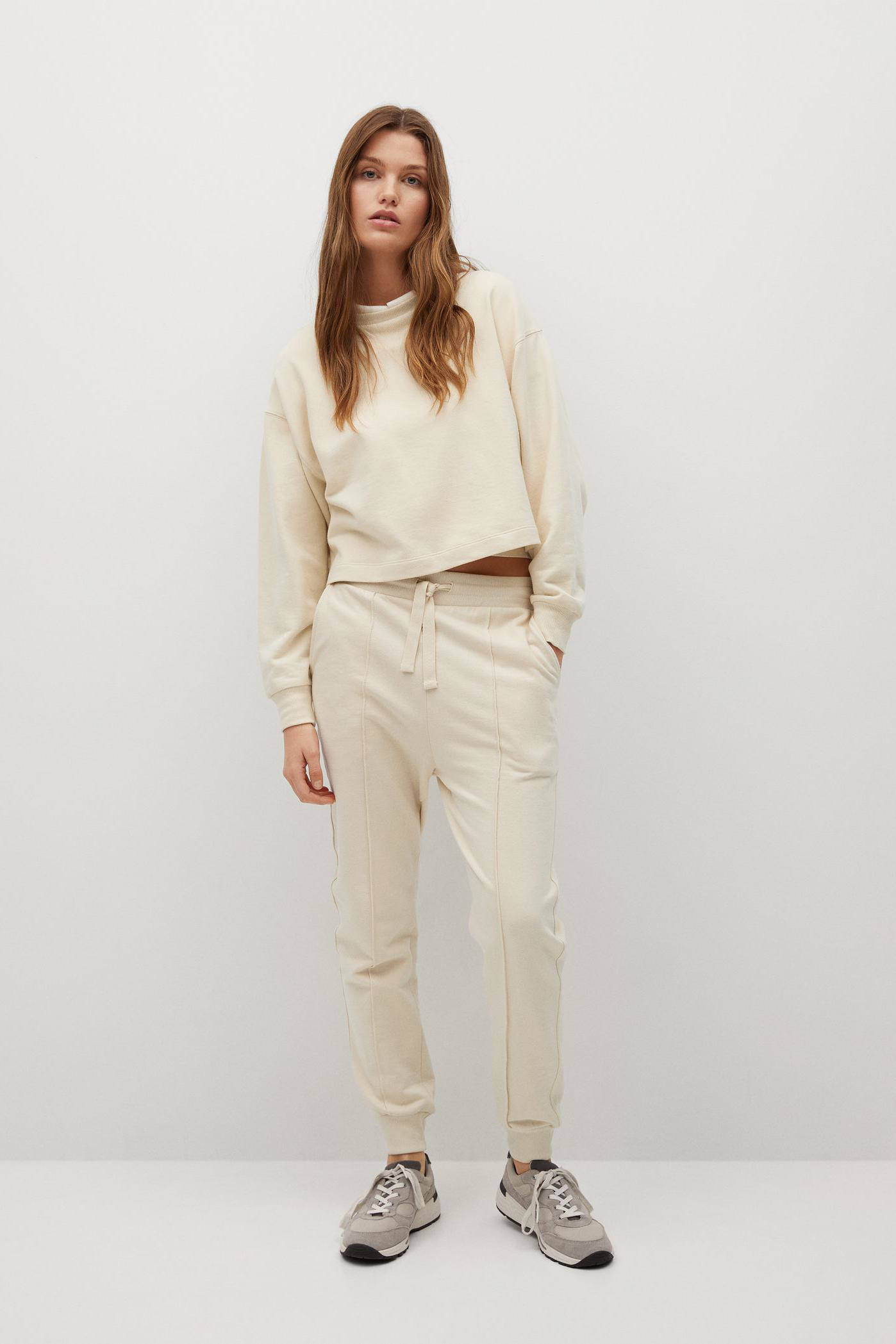 Mango slim fit joggingbroek van biologisch katoen lichtbeige | wehkamp