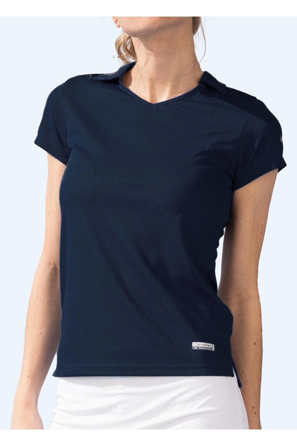Donkerblauwe meisjes Reece sportpolo van polyester met korte mouwen en knoopsluiting