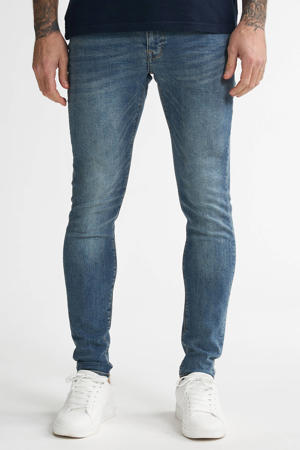skinny jeans NASH met riem medium used