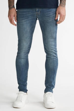 skinny jeans NASH met riem medium used