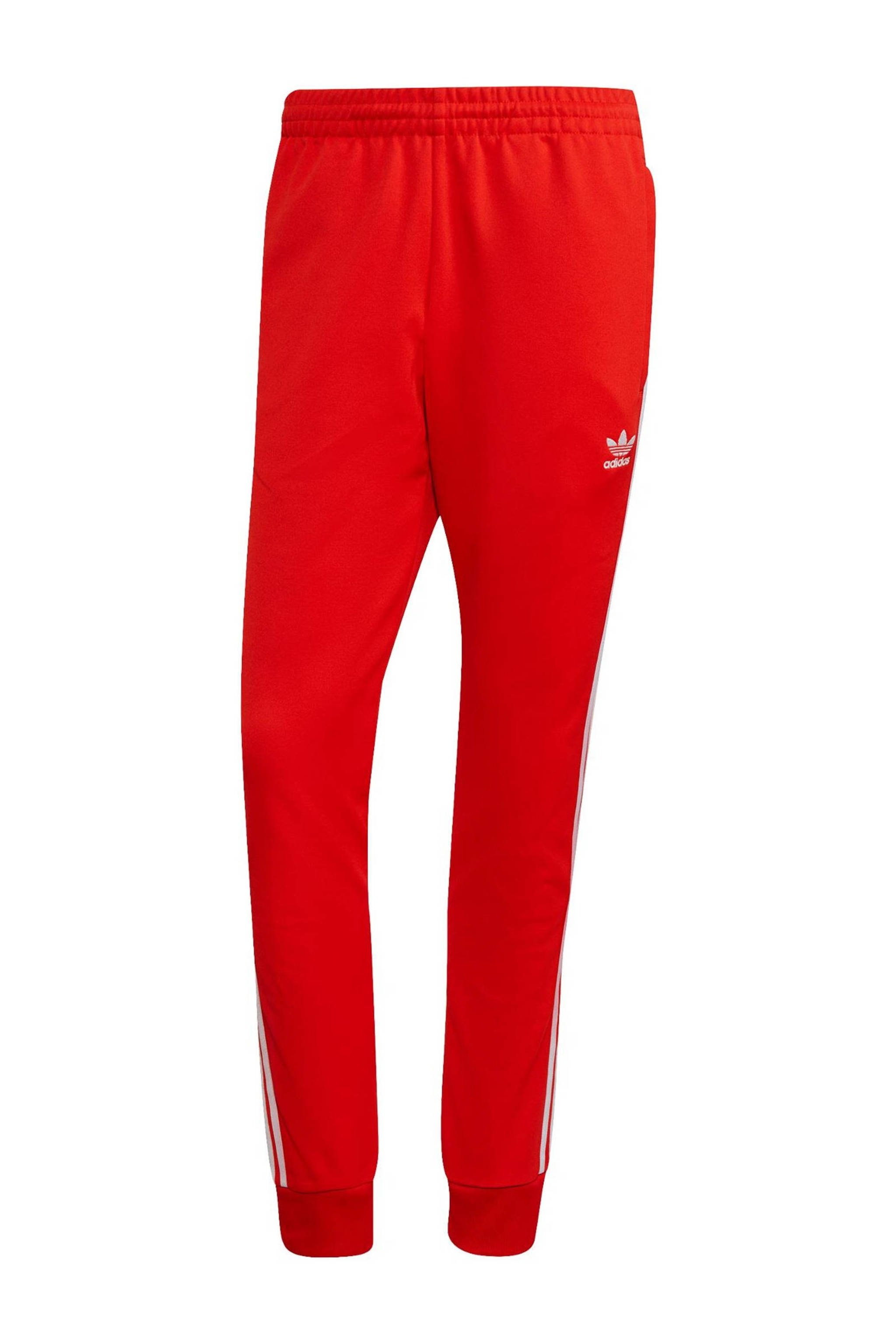 Illustreren reinigen Waarschijnlijk adidas Originals Super Star Adicolor trainingsbroek rood/wit | wehkamp