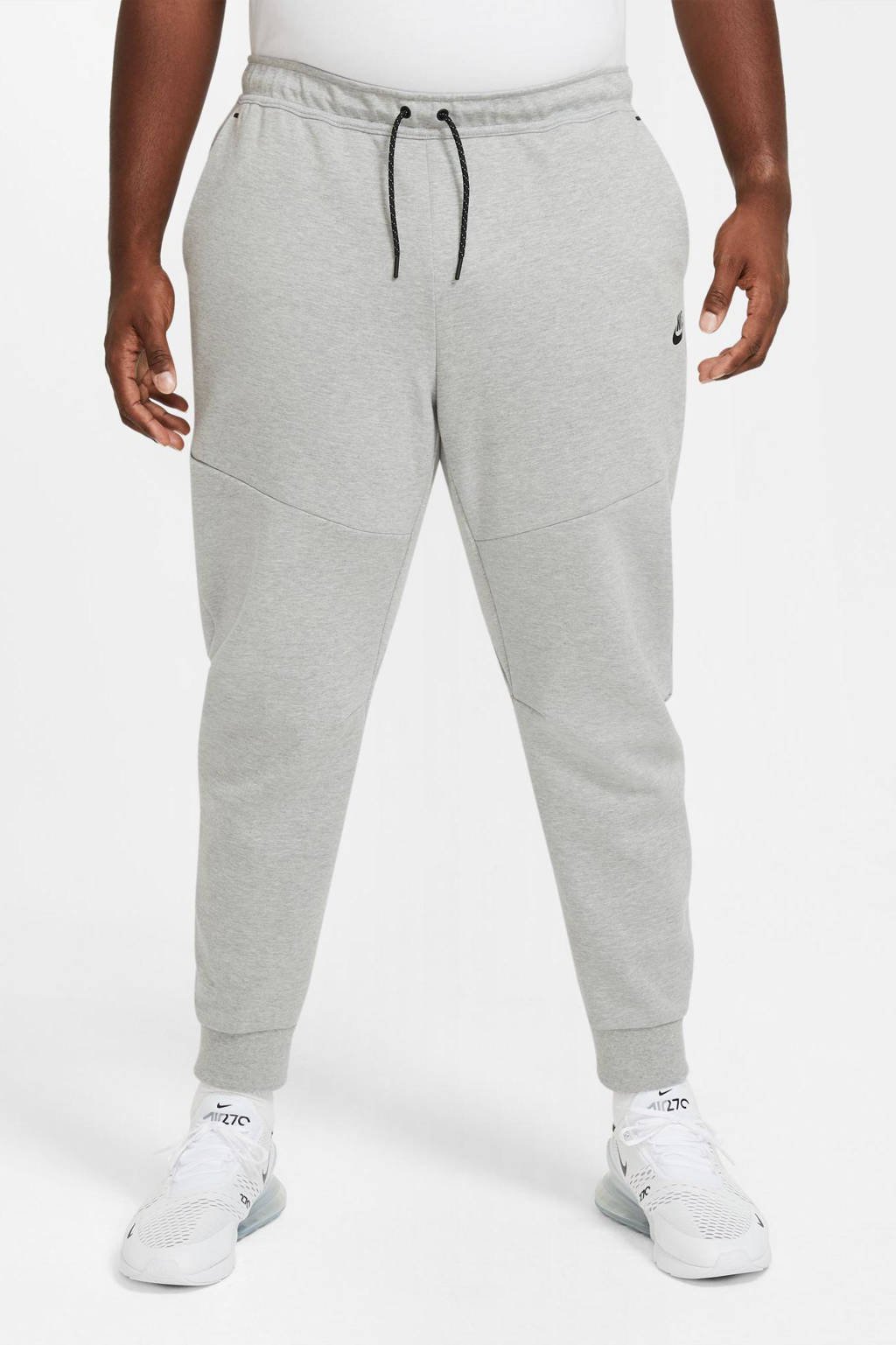 Nike Tech joggingbroek grijs melange/zwart | wehkamp