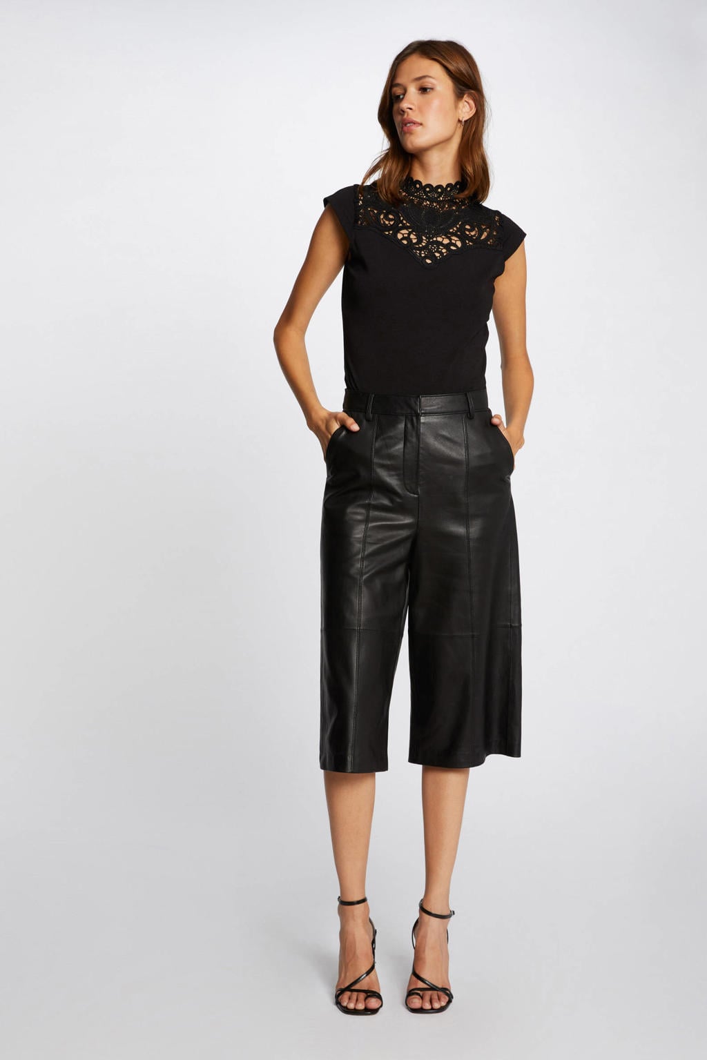 Zwarte dames Morgan top met effen en broderie
