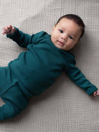 Groene jongens Quapi baby longsleeve Marius van stretchkatoen met lange mouwen, V-hals en drukknoopsluiting