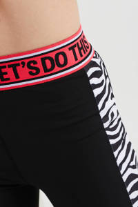 Zwart, wit en roze meisjes WE Fashion van polyester met skinny fit, elastische tailleband en tekst print