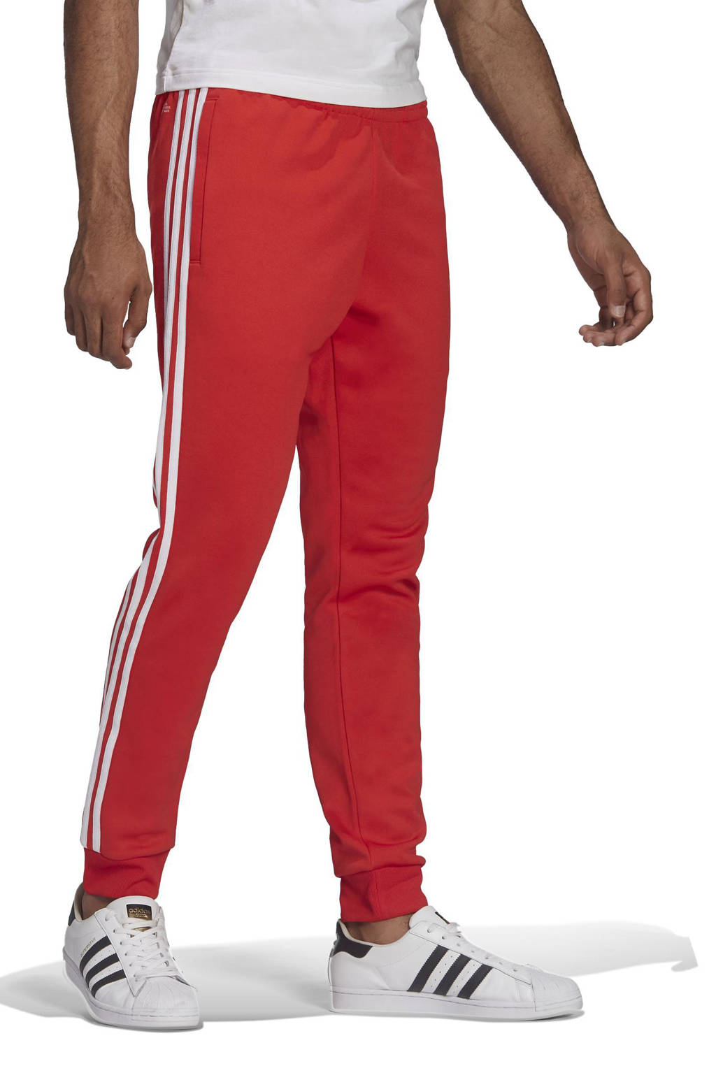 toediening beoefenaar Bejaarden adidas Originals Superstar Adicolor trainingsbroek rood | wehkamp