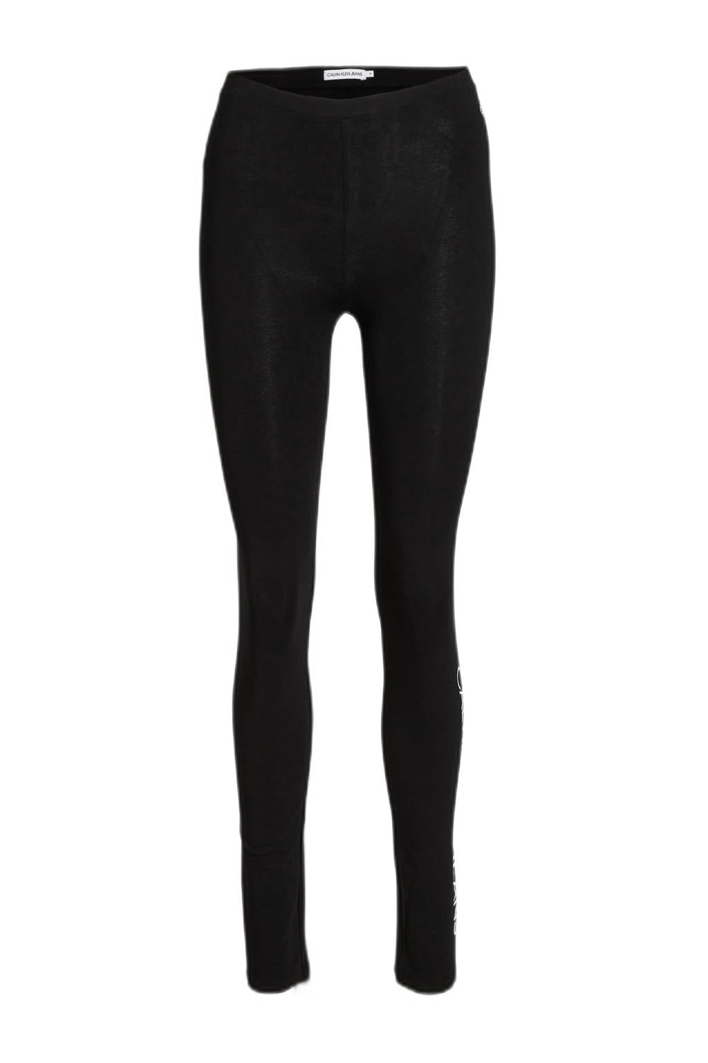 Zwart en witte meisjes CALVIN KLEIN JEANS legging van stretchkatoen met skinny fit, regular waist en logo dessin