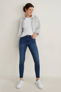 Donkerblauwe dames C&A skinny jeans van duurzaam stretchdenim met regular waist en rits- en knoopsluiting