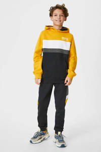 Zwart, geel en witte jongens C&A Skate Nation joggingbroek + hoodie van sweat materiaal met meerkleurige print, lange mouwen, capuchon en elastische tailleband met koord