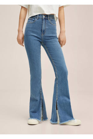 flared jeans met split middenblauw