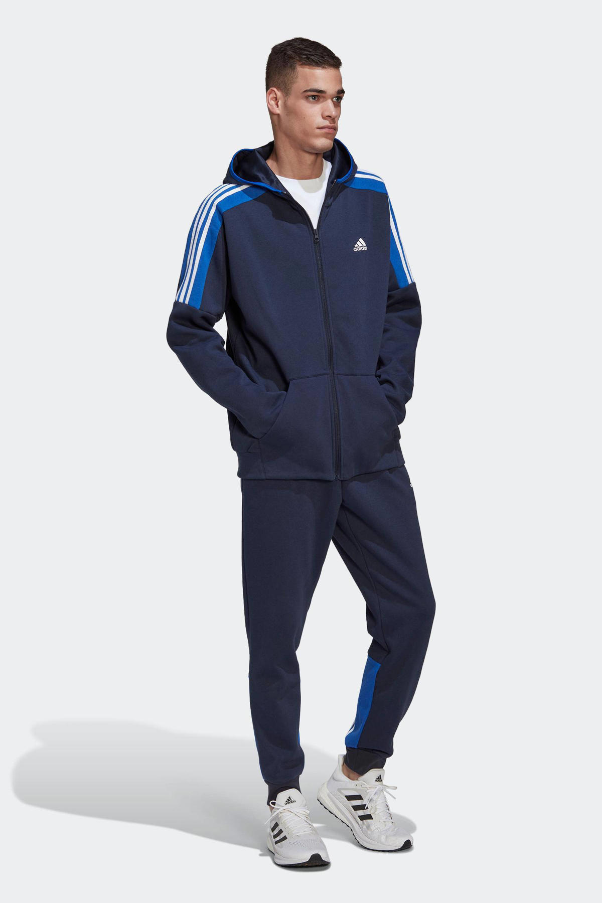 Luidspreker volwassen troosten adidas Performance fleece joggingpak donkerblauw | wehkamp