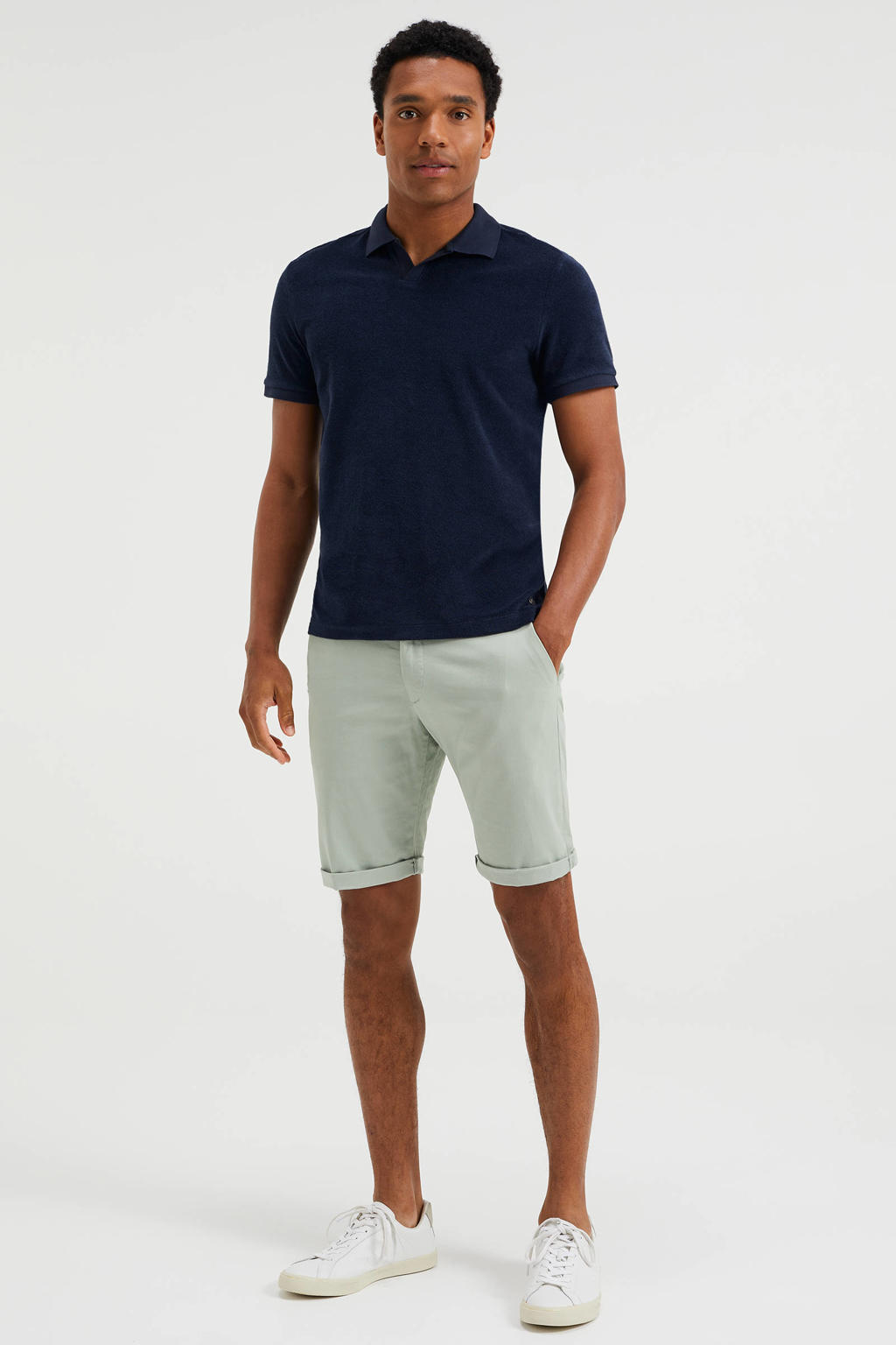 Donkerblauwe heren WE Fashion badstof slim fit polo met korte mouwen en klassieke kraag