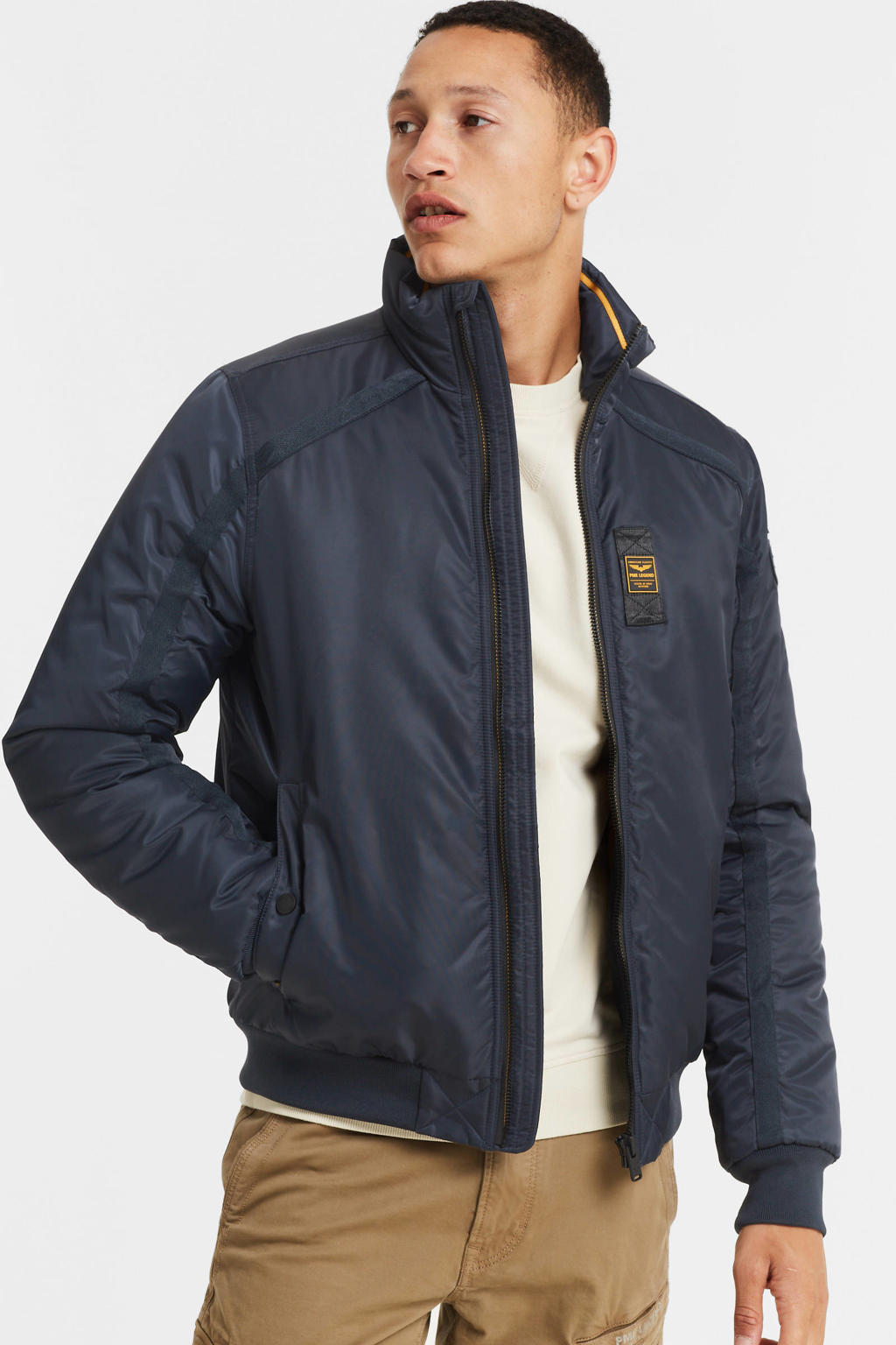 Donkerblauwe heren PME Legend gewatteerde jas van nylon met lange mouwen, opstaande kraag en ritssluiting
