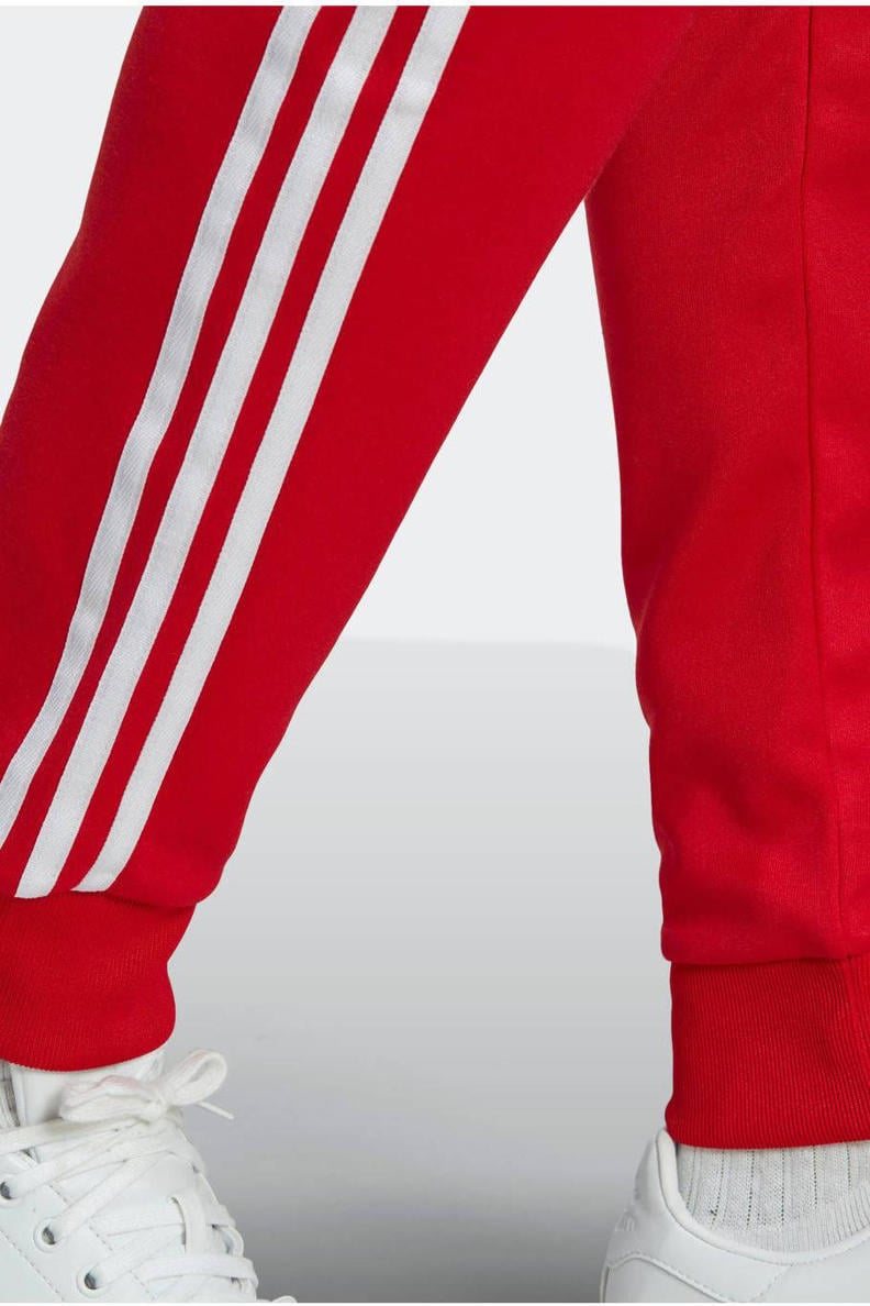 adidas Originals Superstar trainingsbroek rood | wehkamp