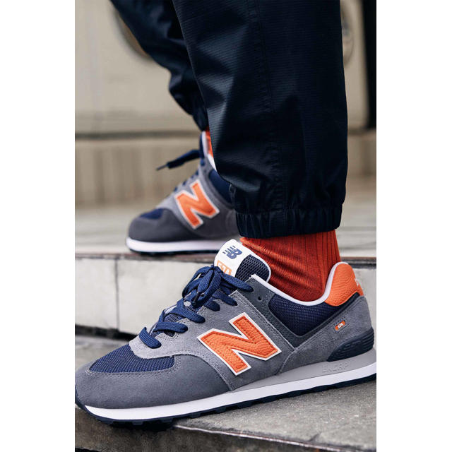 verraad Nacht stopverf New Balance 574 sneakers grijs/donkerblauw/oranje | wehkamp