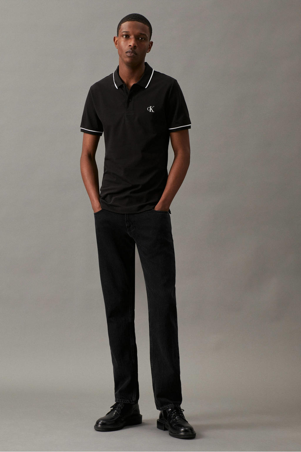 Zwarte heren CALVIN KLEIN JEANS slim fit polo van katoen met logo dessin, korte mouwen en pique
