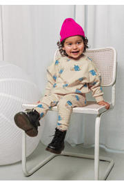 thumbnail: The New Chapter sweater met all over print ecru