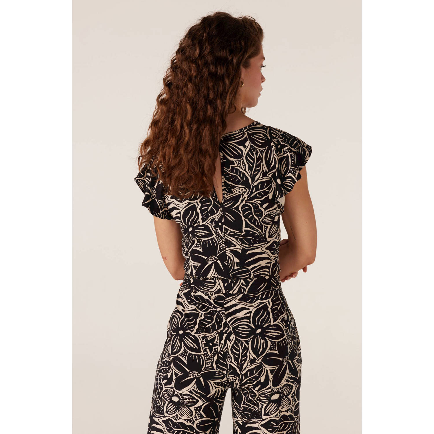 JANSEN Amsterdam jumpsuit met all over print zwart beige