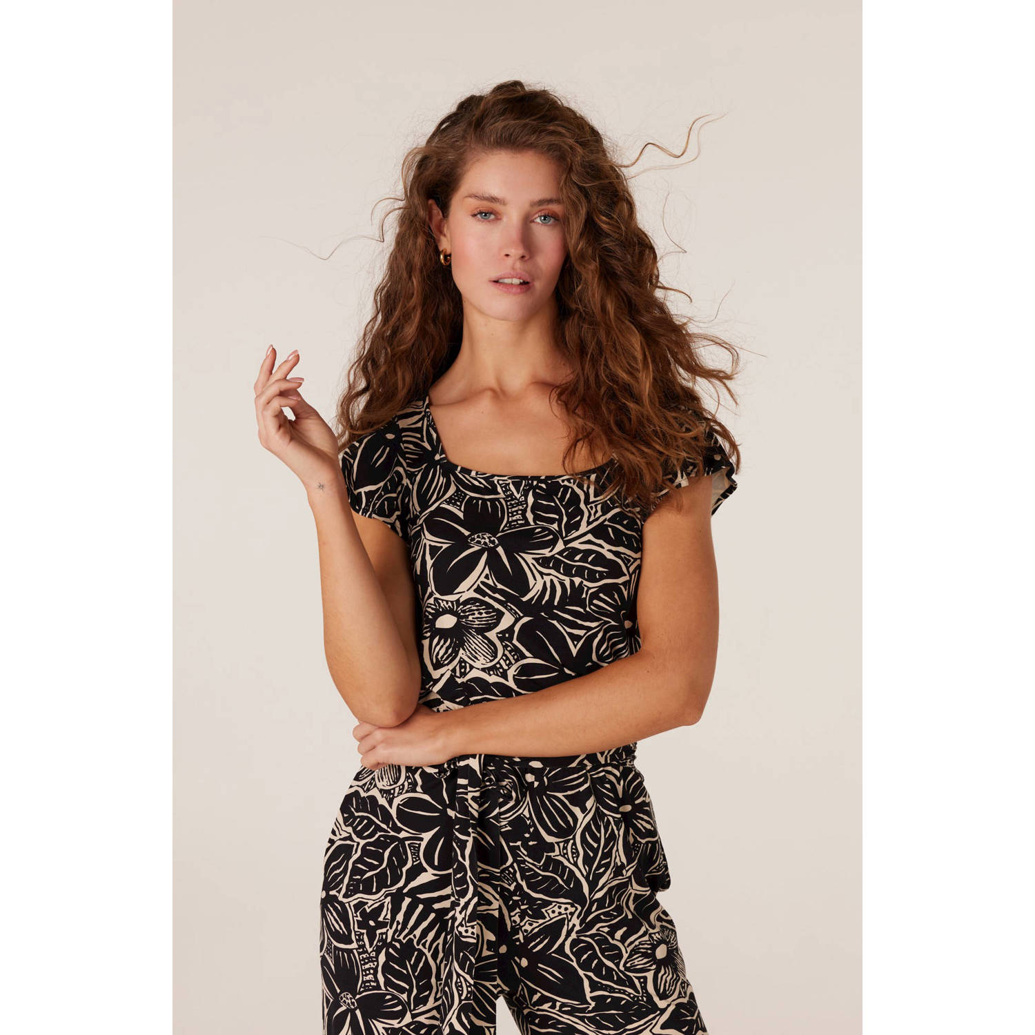 JANSEN Amsterdam jumpsuit met all over print zwart beige