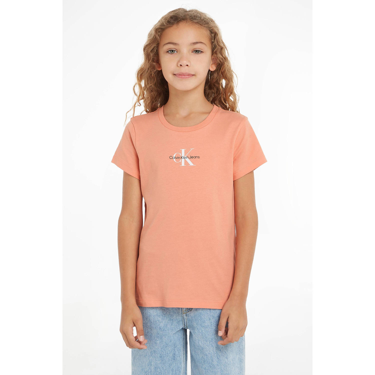 Calvin Klein Jeans T-shirt met logo lichtoranje Meisjes Katoen Ronde hals 152