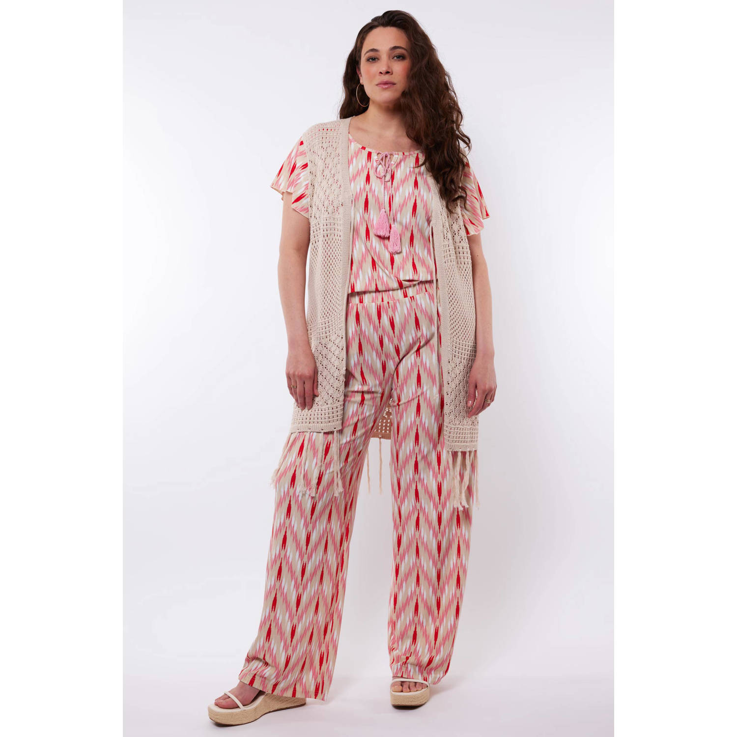 Exxcellent gebreid vest zand