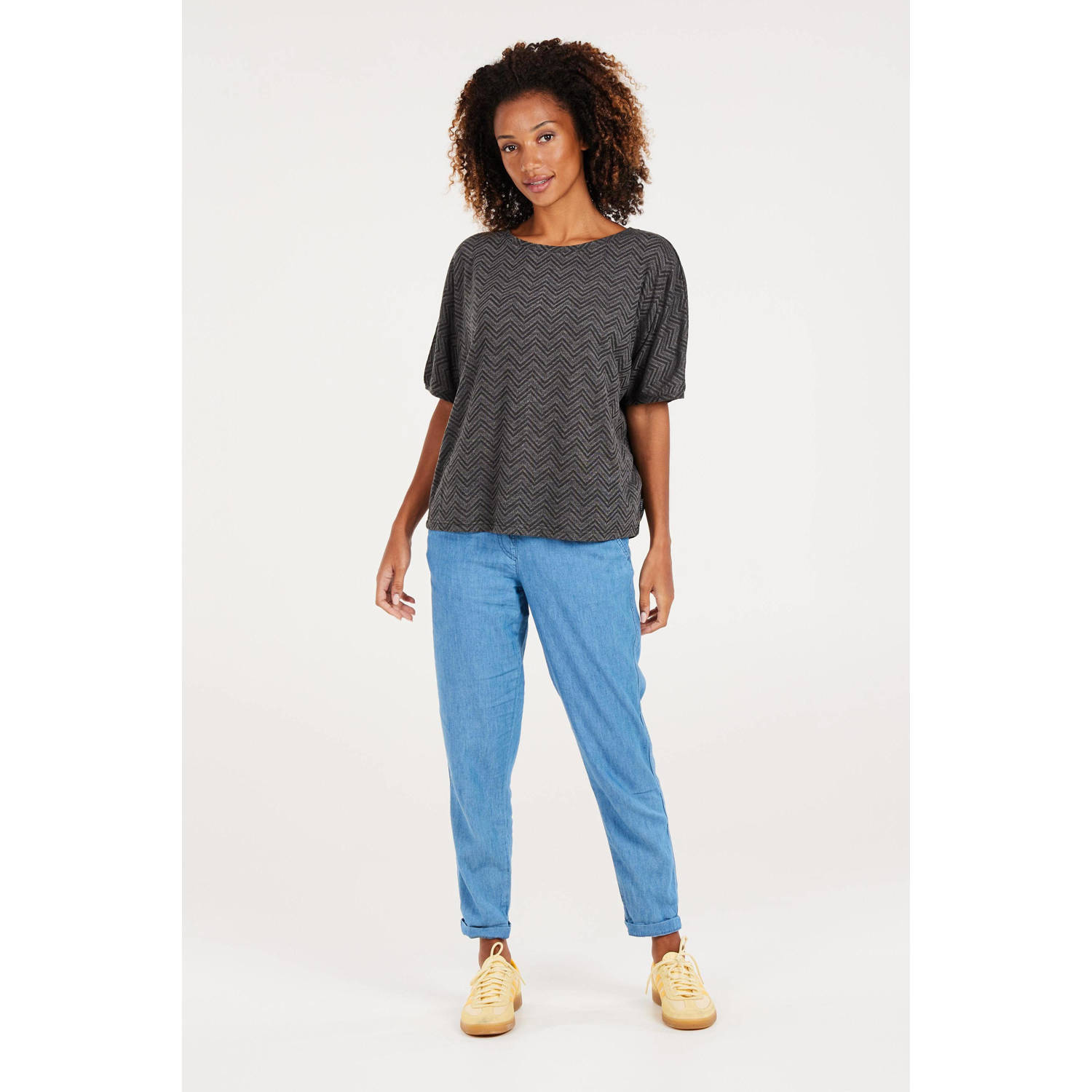 Protest top met all over print