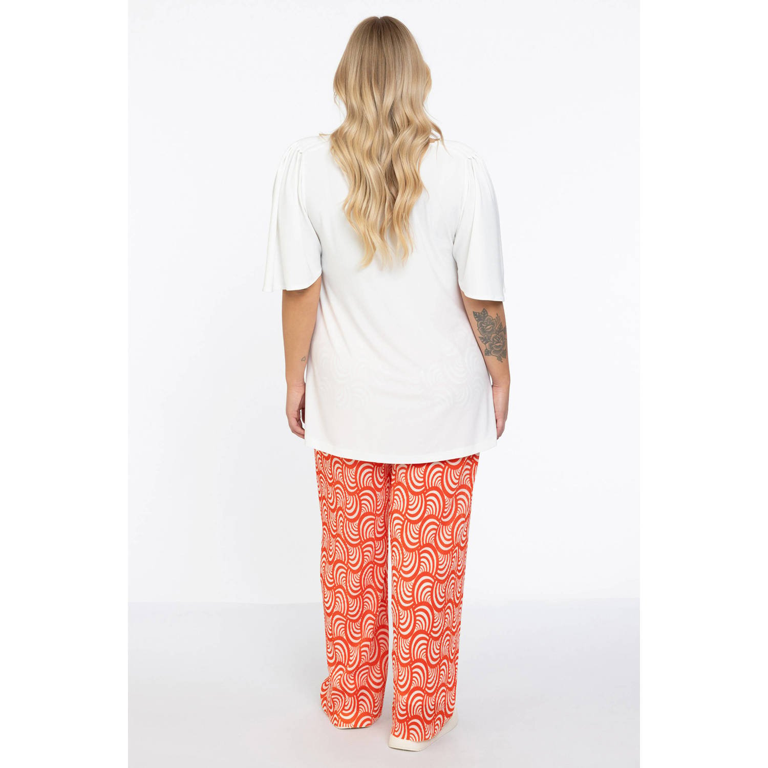 Yoek loose fit broek met all over print oranje