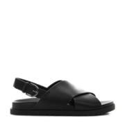 thumbnail: Zwarte meisjes Mango Kids sandalen van 96% polyurethaan, 4% zink. voering: 96% polyurethaan, 4% polyester.inlegzooltje: 100% polyurethaan. met gesp en effen