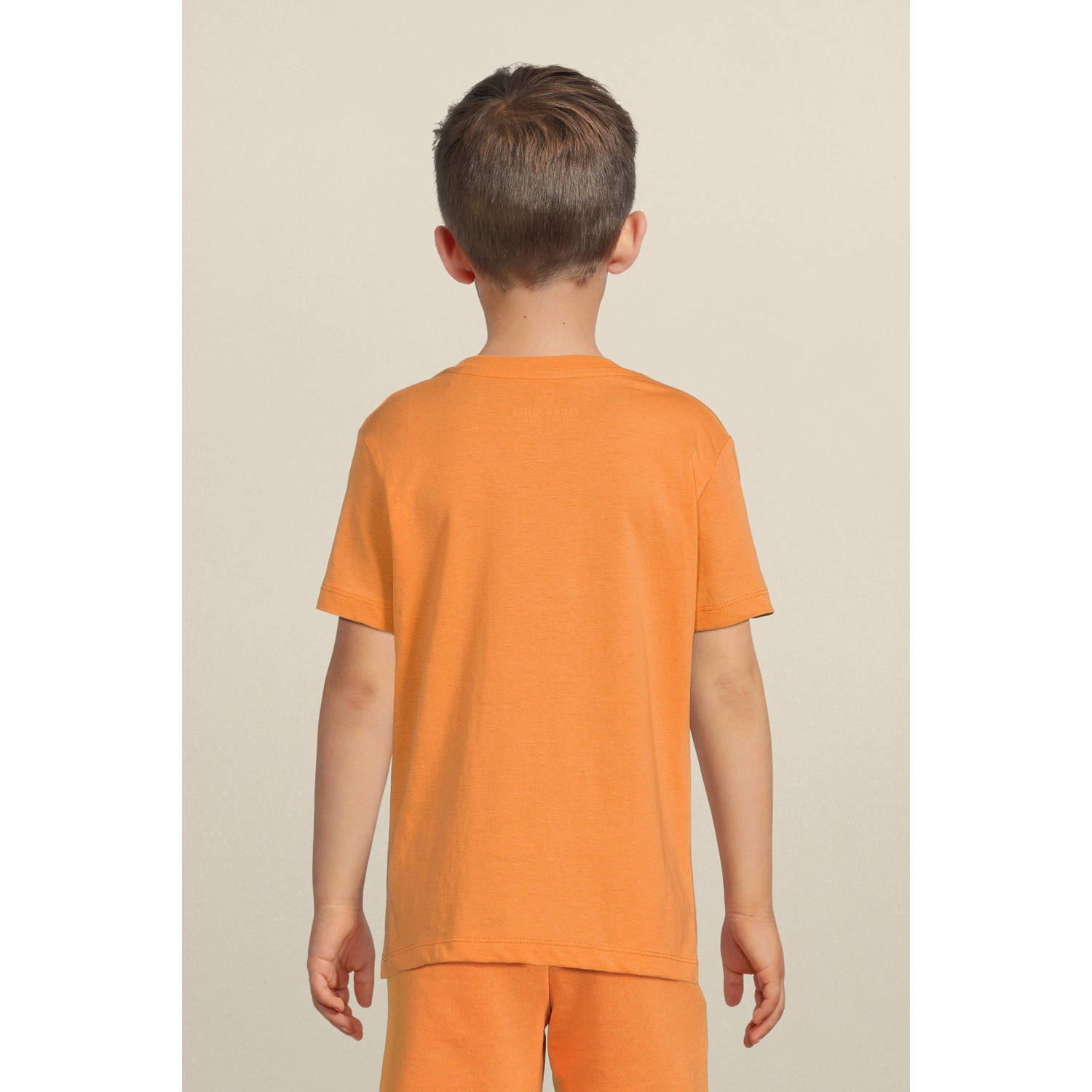 JACK & JONES JUNIOR T-shirt JCOKAPPER met logo lichtoranje