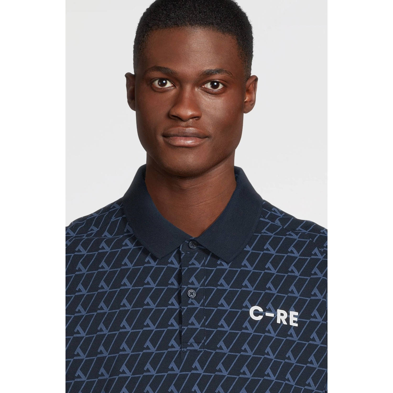 JACK & JONES CORE regular fit polo met all over print JCOSUMMER donkerblauw