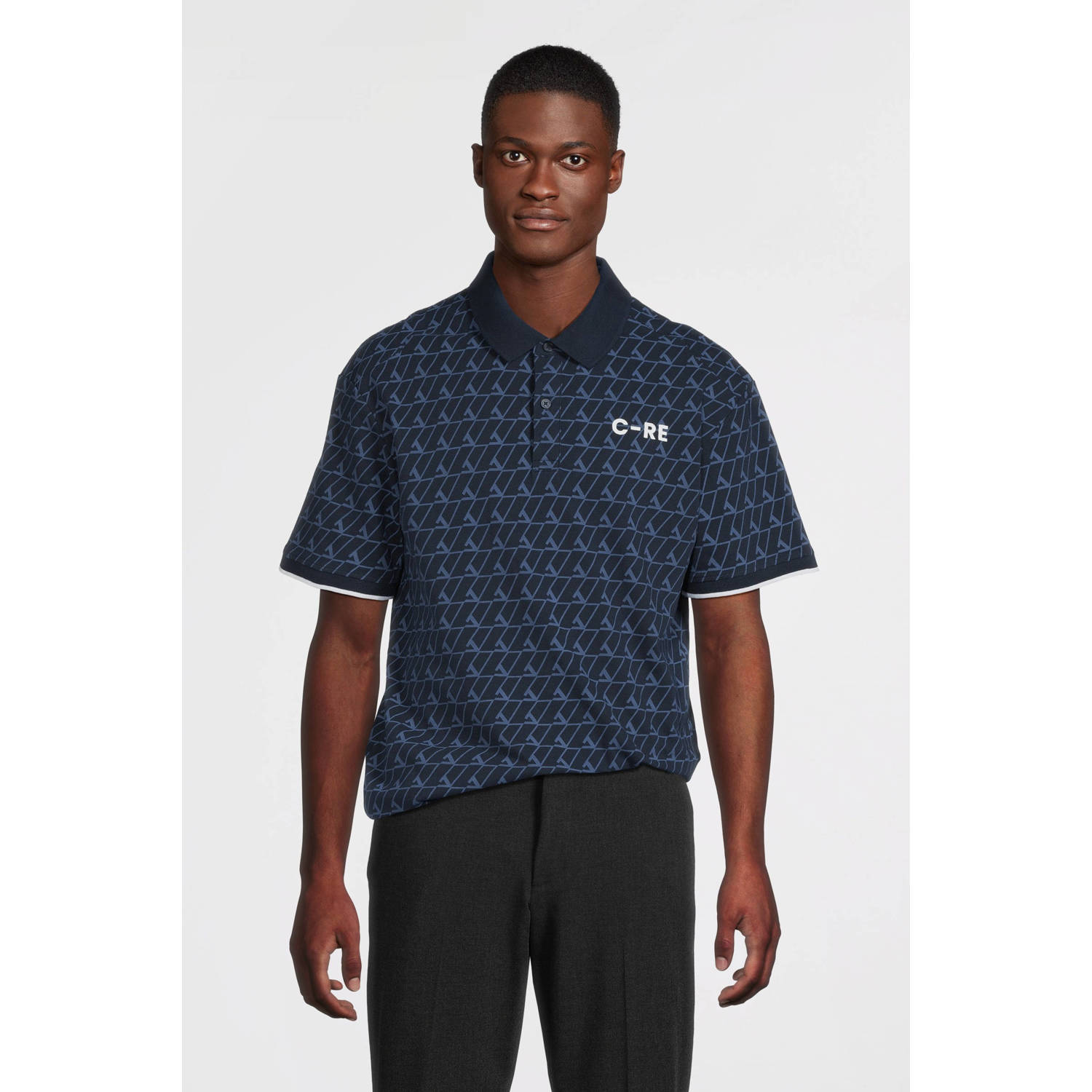 JACK & JONES CORE regular fit polo met all over print JCOSUMMER donkerblauw
