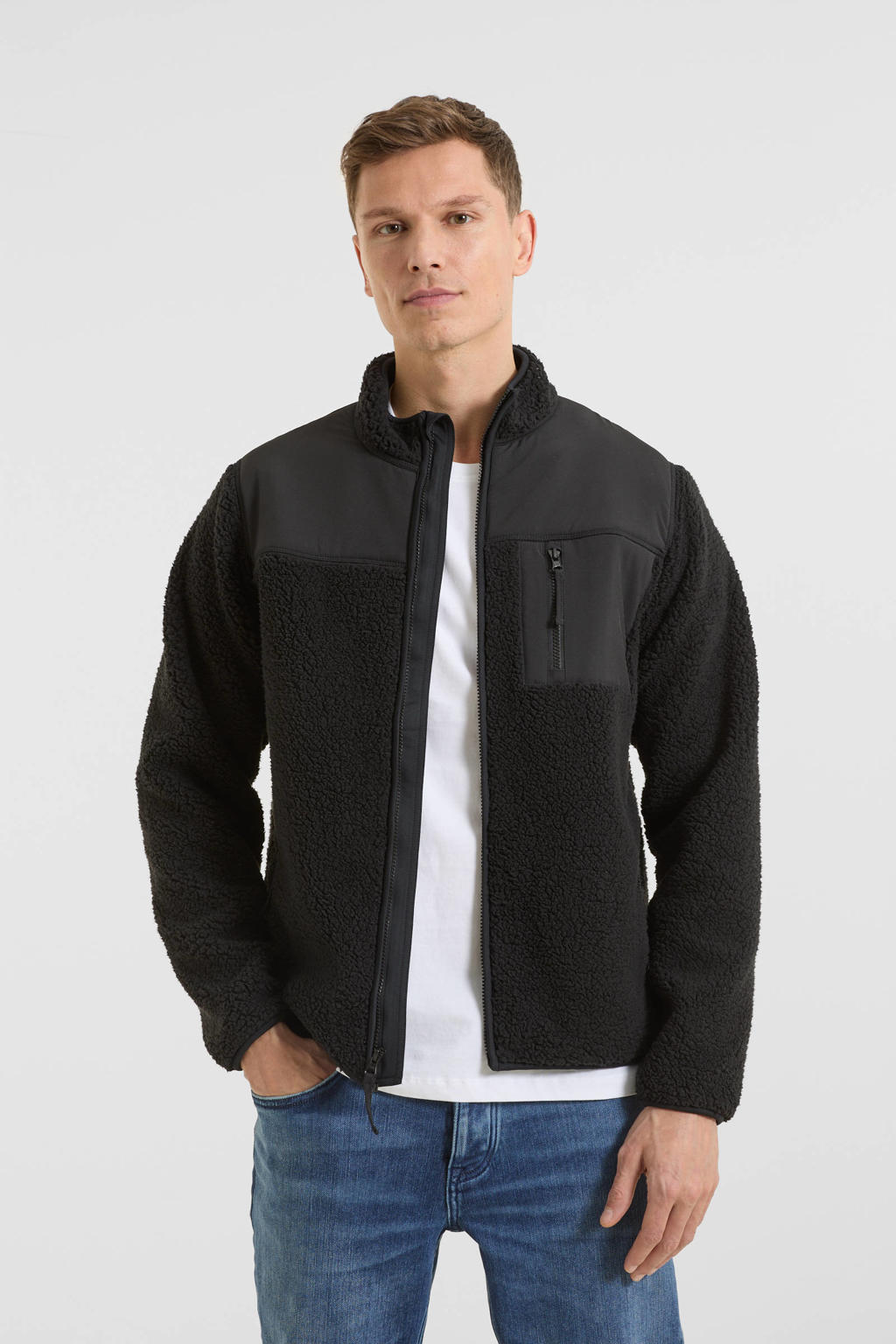 Zwarte heren Anytime fleece vest van teddy materiaal met effen, lange mouwen, opstaande kraag en ritssluiting