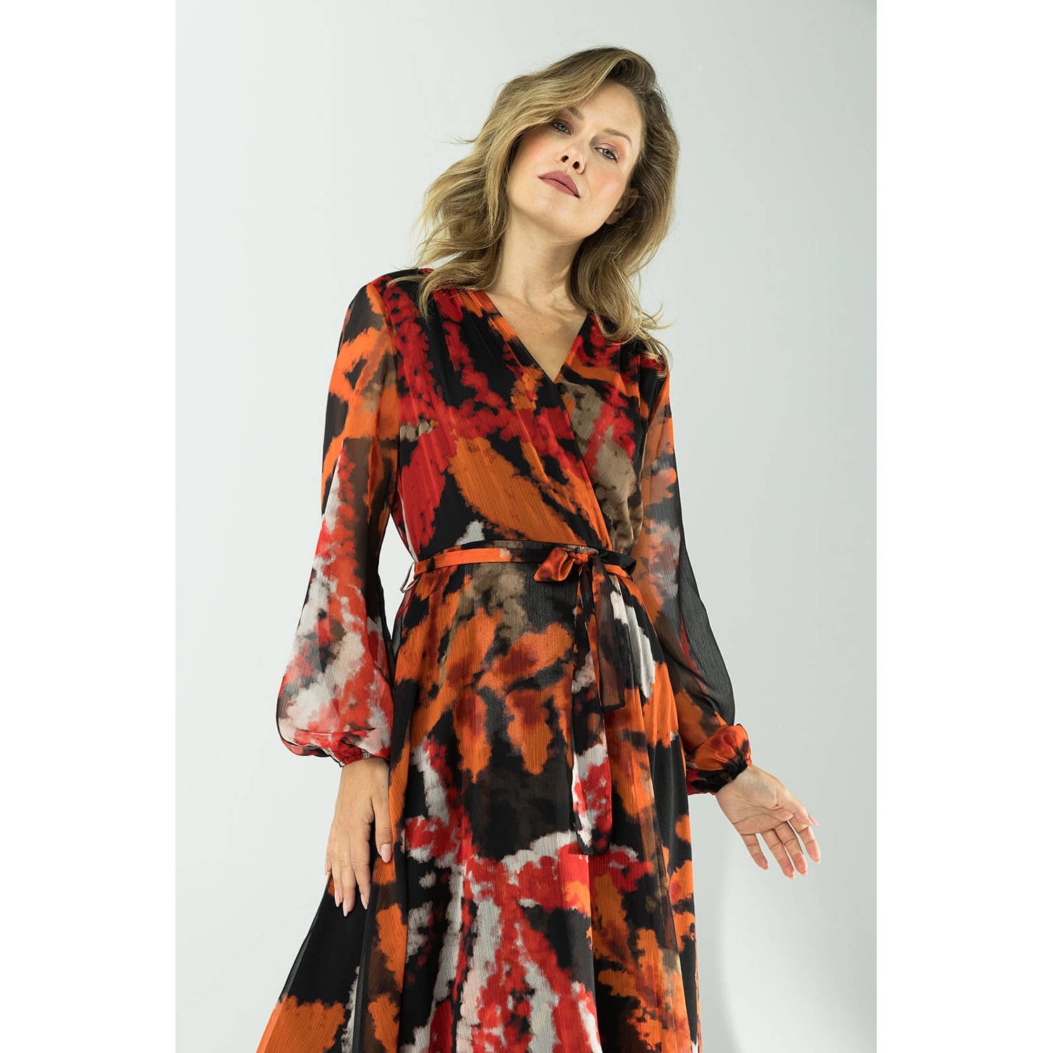 LabeL DOT wikkeljurk met all over print en mesh oranje rood zwart