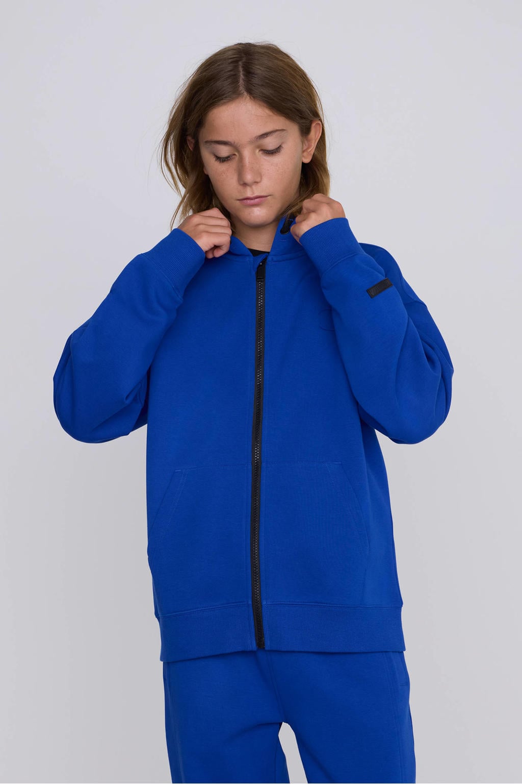 Blauwe jongens en meisjes Coolcat Unisex Vest Charly Blauw van katoen met printopdruk, lange mouwen, capuchon en ritssluiting