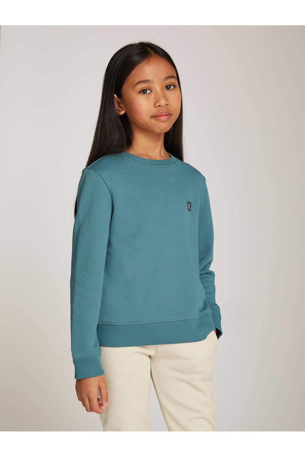 Blauwe jongens en meisjes Calvin Klein sweater zee van katoen met logo dessin, lange mouwen, ronde hals en elastische boord