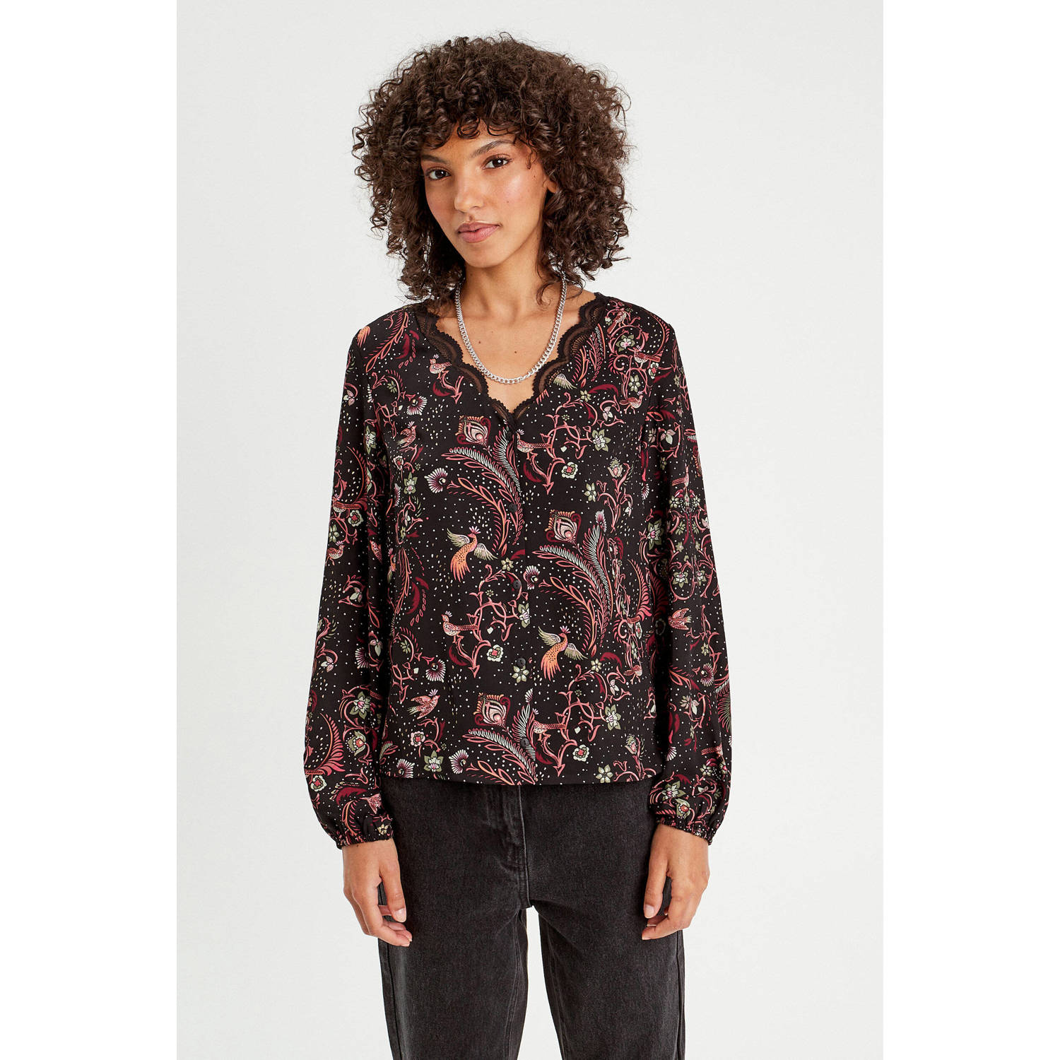 Cache blouse met all over print zwart multi
