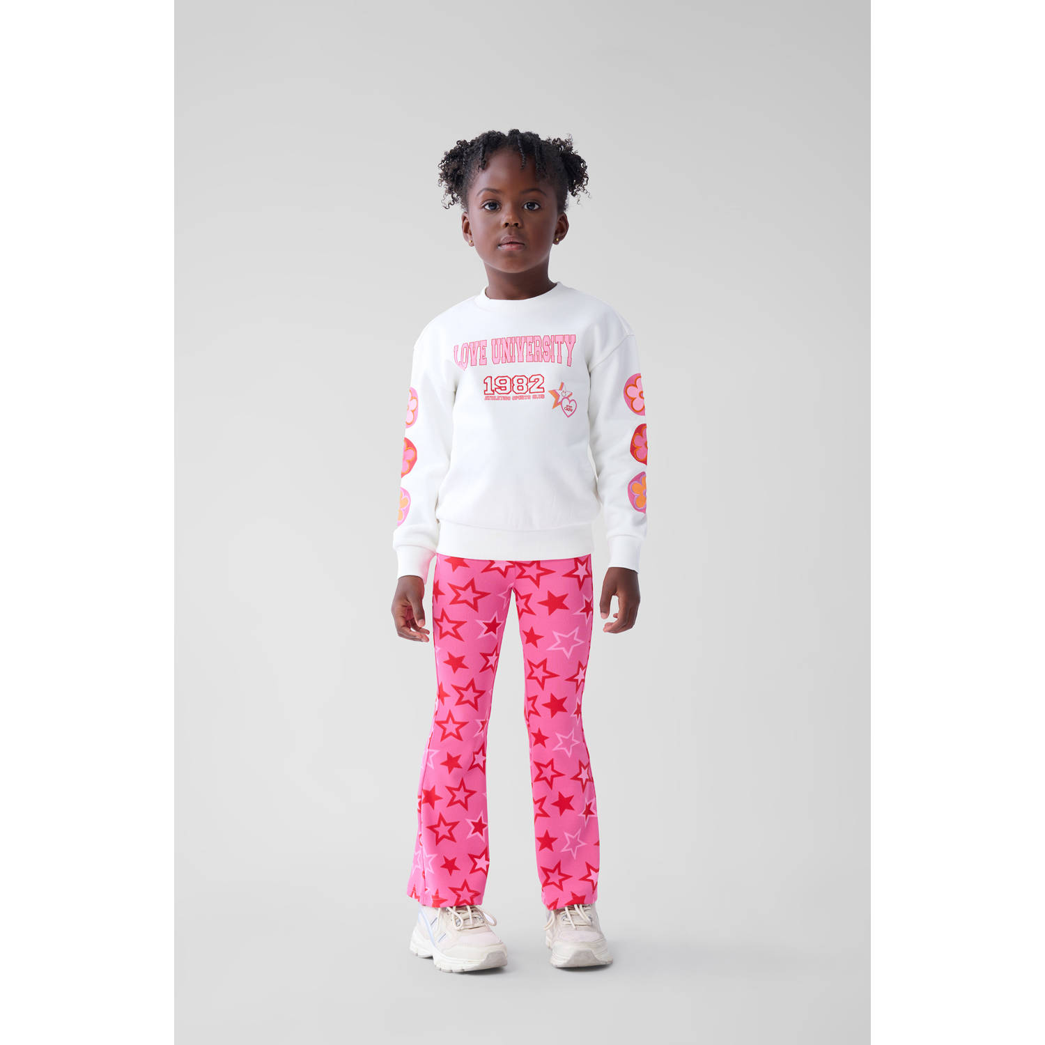 Shoeby high waist flared broek met all over print roze