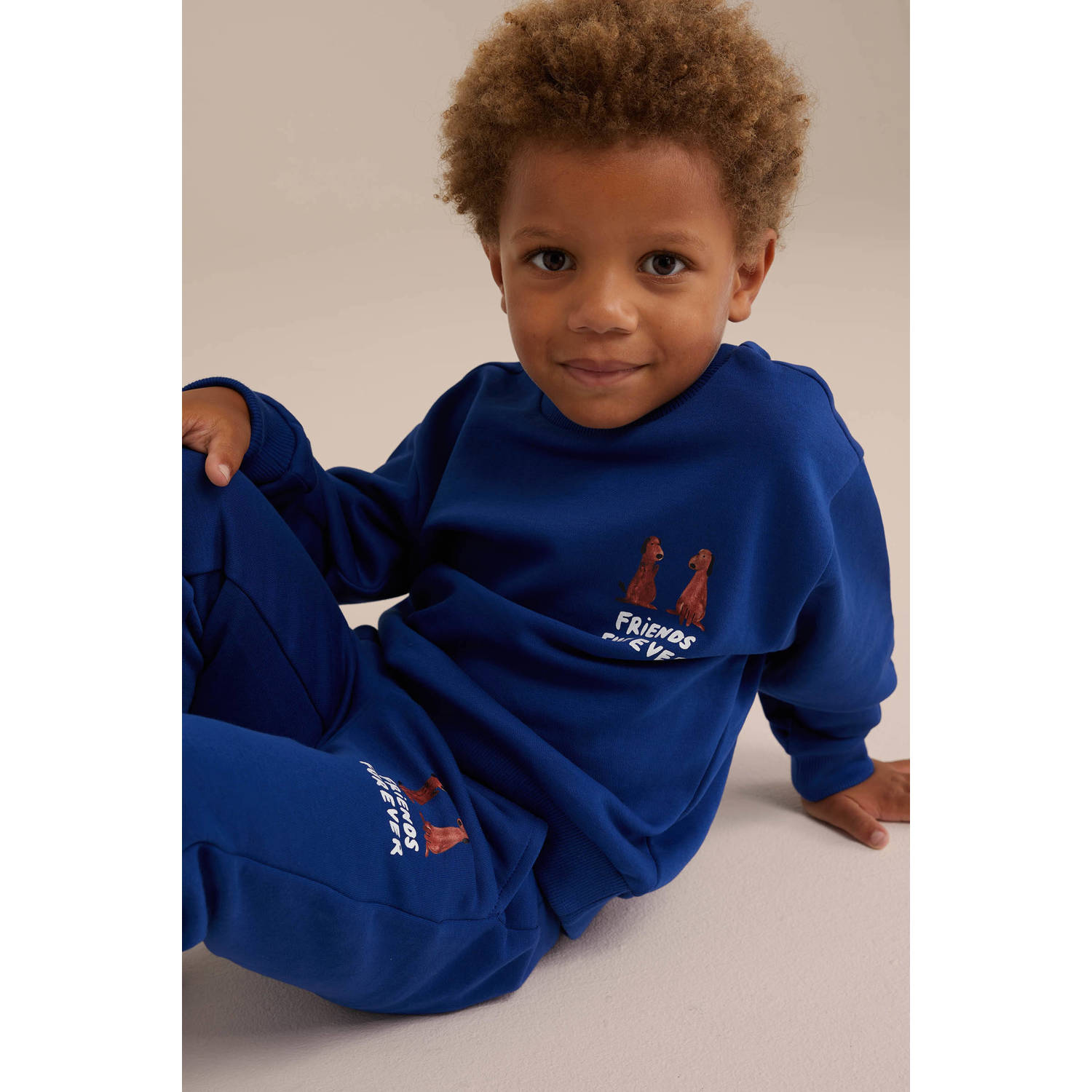 WE Fashion slim fit broek met printopdruk kobalt blauw