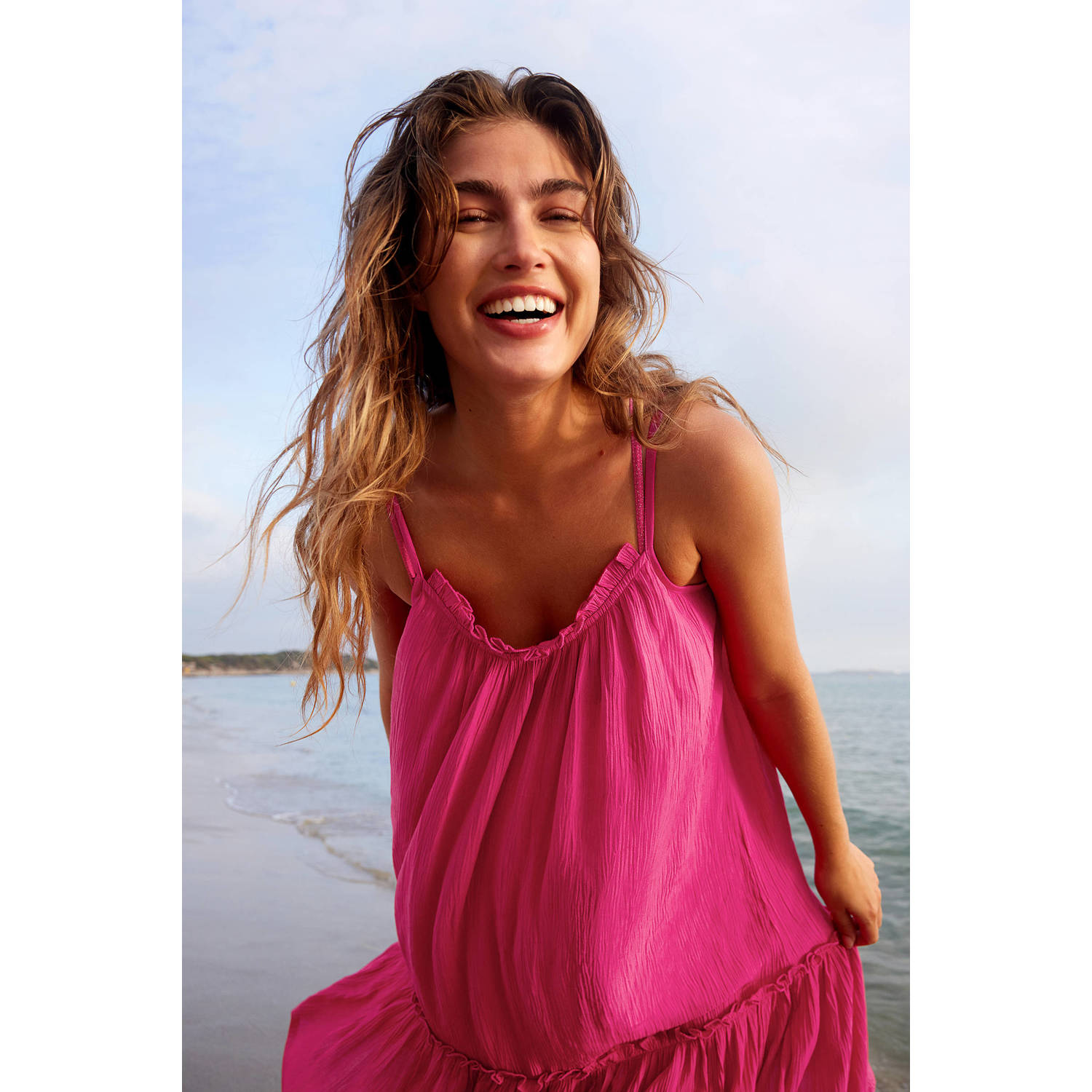BEACHWAVE crinkle strandjurk fuchsia