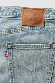 thumbnail: Levi's 568 loose fit jeans at the laundromat