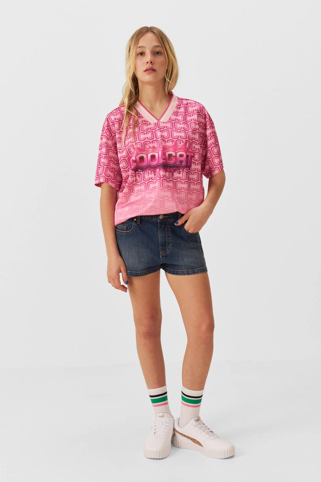 Medium blue denim meisjes Coolcat short Loua van denim met rits- en knoopsluiting en effen
