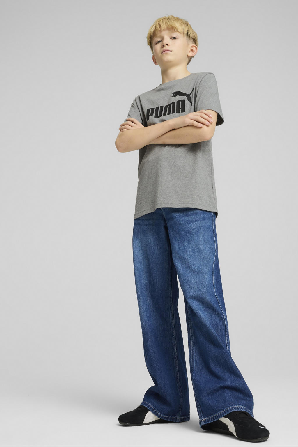 Grijs melange jongens en meisjes Puma T-shirt melange van katoen met logo dessin, korte mouwen en ronde hals